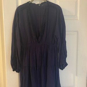 Plum dress with ruffle trim and deep V cut